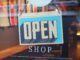 Open shop sign in a store as SAP and Google Cloud are deploying agentic commerce architecture to automate multi-agent marketing and retail operations at enterprise scale.